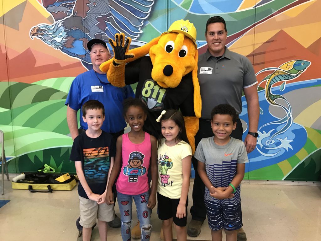 Digger Ms. Maria and AGL visit Baker Place Elementary Digger Dog